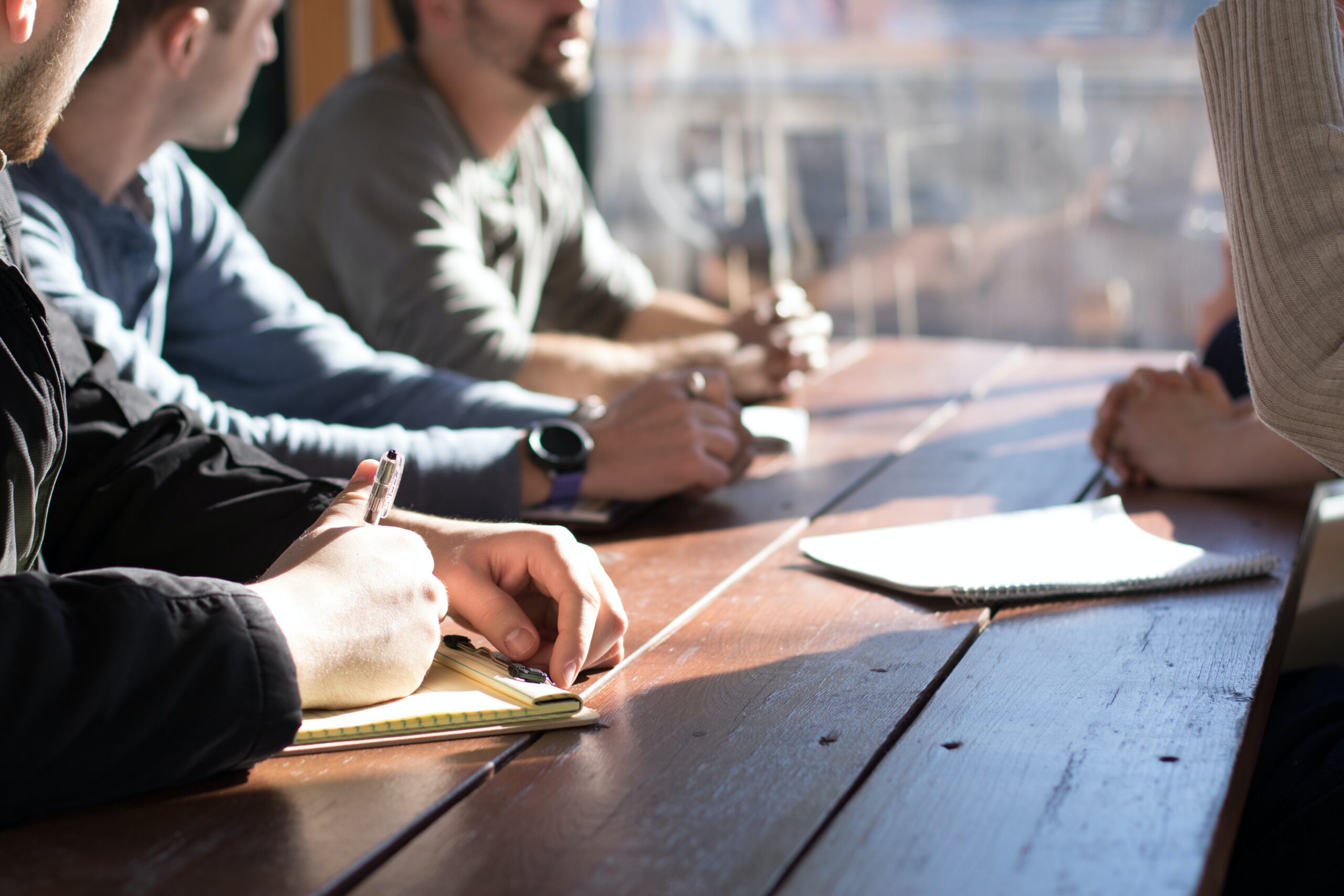 a group of people are participating in a recruitment interview