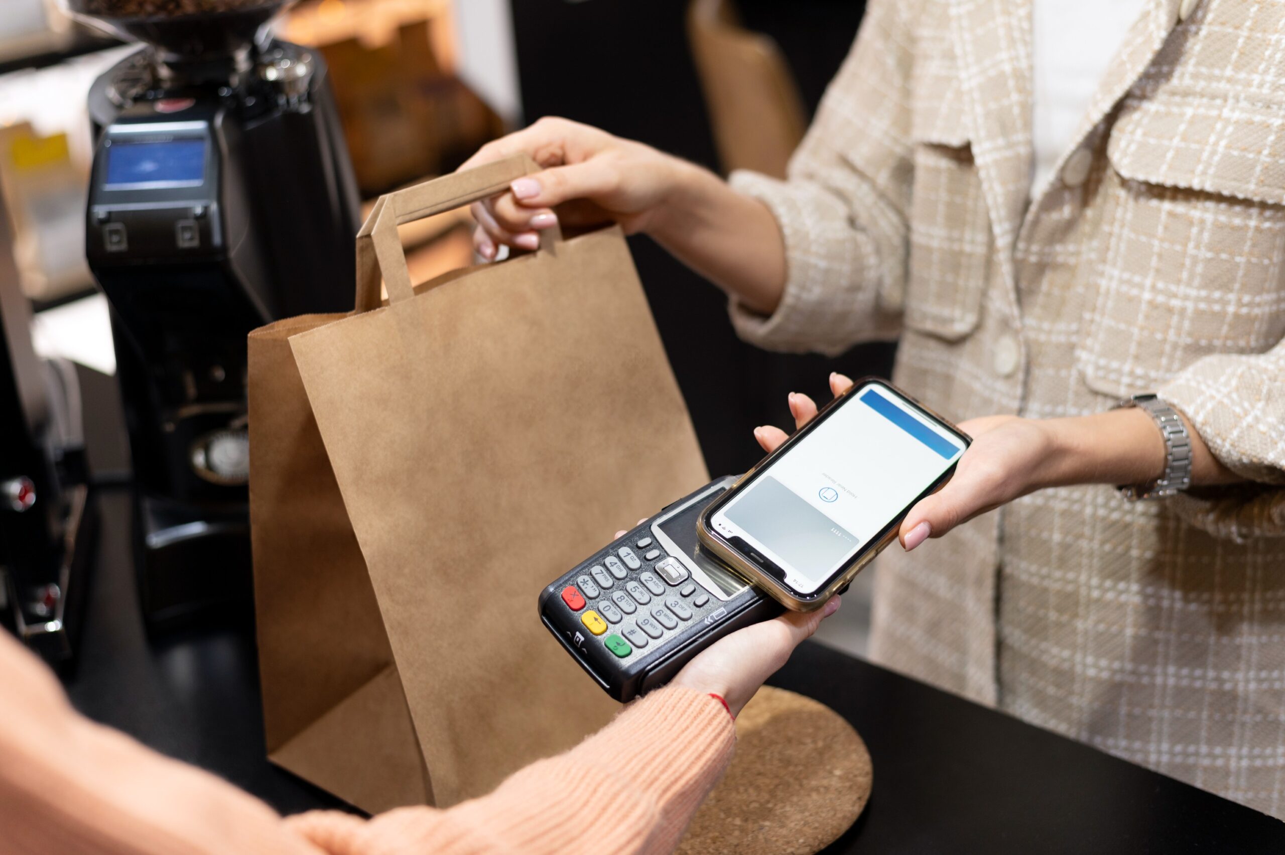 person paying with its smartphone wallet app 1