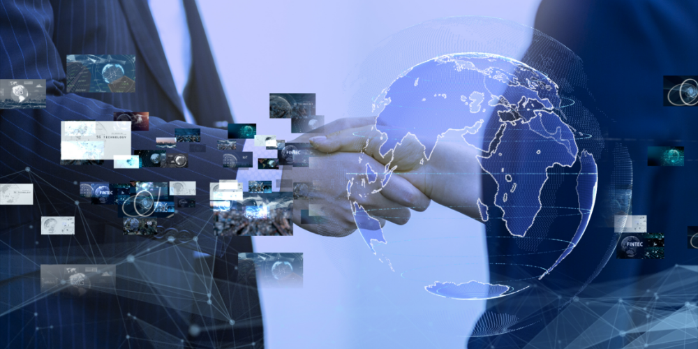 Two business professionals shaking hands over a digital globe and network interface, symbolizing GEM Corporation’s global tech partnership.