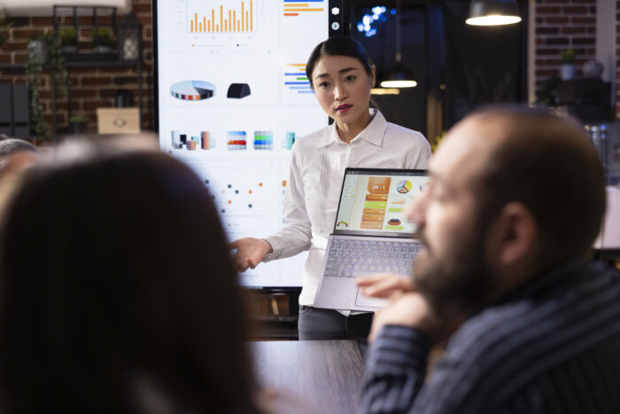 Asian entrepreneur discussing marketing strategy