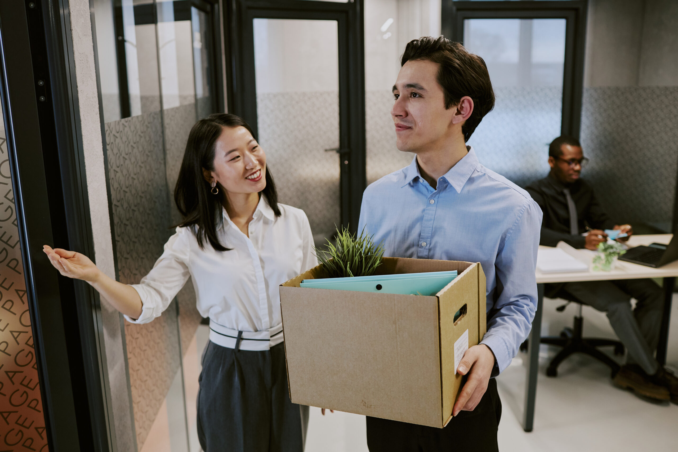 Young HR Manager Showing Office To New Employee